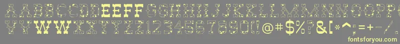 AbileneCow Font – Yellow Fonts on Gray Background