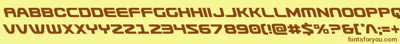 フォントUsuzileft – 茶色の文字が黄色の背景にあります。