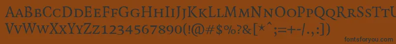 Więcej informacji o czcionce QuadraatSmallcaps Czcionka QuadraatSmallcaps – czarne czcionki na brązowym tle