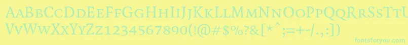 QuadraatSmallcaps Font – Green Fonts on Yellow Background