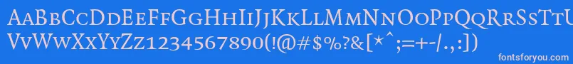 QuadraatSmallcaps Font – Pink Fonts on Blue Background