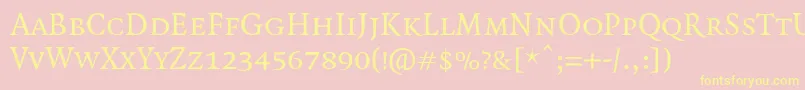 QuadraatSmallcaps Font – Yellow Fonts on Pink Background