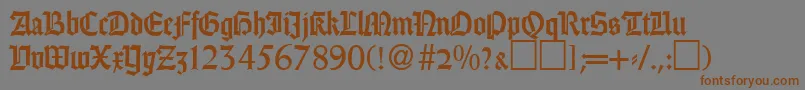 Fonte GothicRegularDb – fontes marrons em um fundo cinza