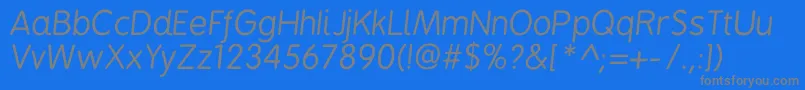フォントBpreplayitalics – 青い背景に灰色の文字
