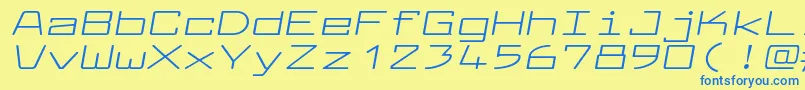 LarabiefontxtItalic-Schriftart – Blaue Schriften auf gelbem Hintergrund