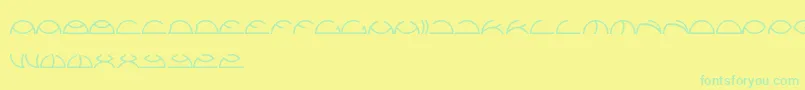 Saintfighteraqua Font – Green Fonts on Yellow Background