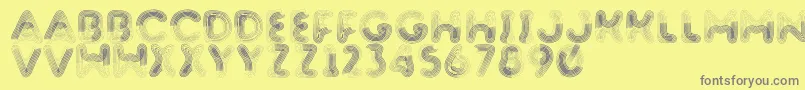 Barnstormer-Schriftart – Graue Schriften auf gelbem Hintergrund