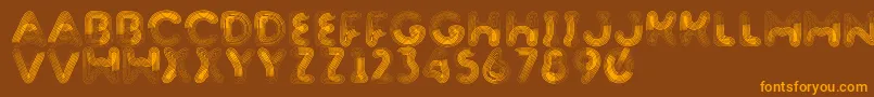 フォントBarnstormer – オレンジ色の文字が茶色の背景にあります。