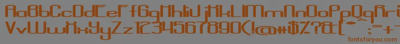 フォントAposiopesisDwarfed – 茶色の文字が灰色の背景にあります。