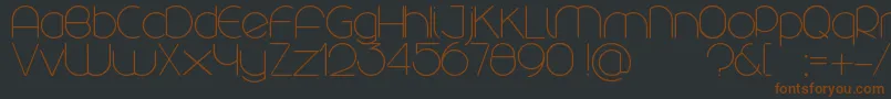 Rounded-fontti – ruskeat fontit mustalla taustalla