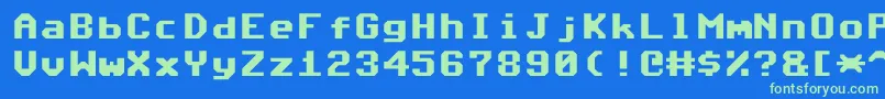 フォントCommodore64Angled – 青い背景に緑のフォント