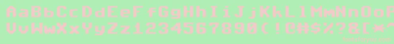 フォントCommodore64Angled – 緑の背景にピンクのフォント