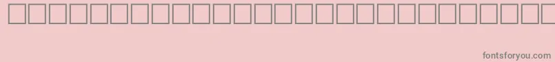 SymbolTypeB-fontti – harmaat kirjasimet vaaleanpunaisella taustalla