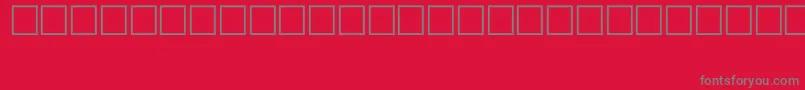 SymbolTypeB-fontti – harmaat kirjasimet punaisella taustalla