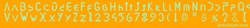 Vegesignes Font – Green Fonts on Orange Background