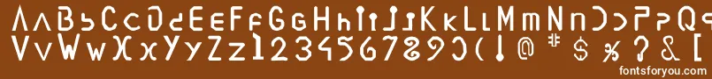 フォントVegesignes – 茶色の背景に白い文字