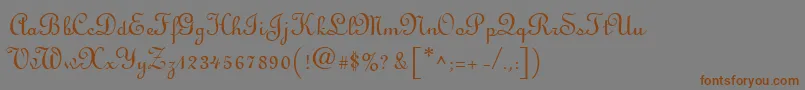 フォントLinusscriptRegular – 茶色の文字が灰色の背景にあります。