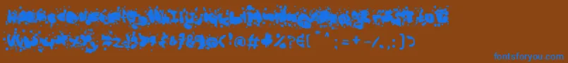フォントMadBubbles – 茶色の背景に青い文字