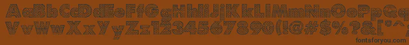 Bricks-Schriftart – Schwarze Schriften auf braunem Hintergrund