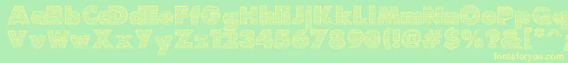 Bricks Font – Yellow Fonts on Green Background