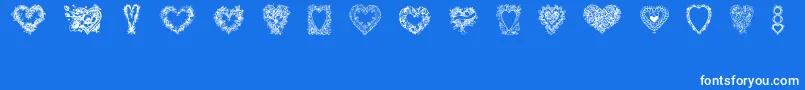 HeartsOfLime-Schriftart – Weiße Schriften auf blauem Hintergrund