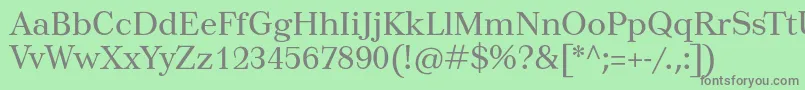 フォントTusar – 緑の背景に灰色の文字