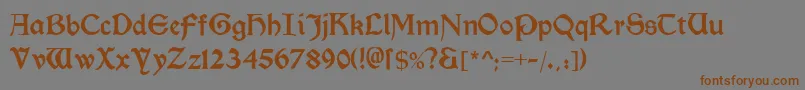 フォントMorrisromanblack – 茶色の文字が灰色の背景にあります。