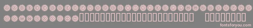 フォントKrBlazingSun – 灰色の背景にピンクのフォント
