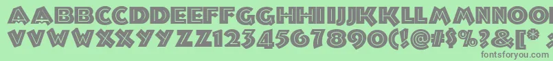 フォントTroglodyte ffy – 緑の背景に灰色の文字