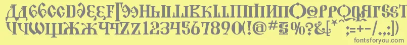 KremlinGrandDuke-Schriftart – Graue Schriften auf gelbem Hintergrund