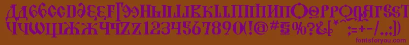フォントKremlinGrandDuke – 紫色のフォント、茶色の背景