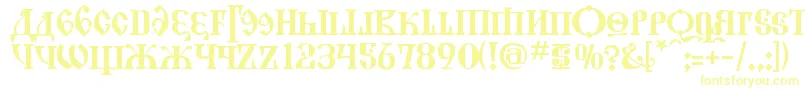 フォントKremlinGrandDuke – 白い背景に黄色の文字