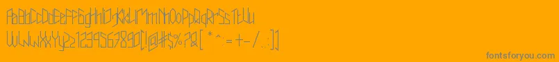 Trianzulvex-Schriftart – Graue Schriften auf orangefarbenem Hintergrund