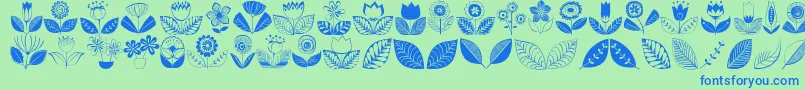Doodledings2Retroflowers-Schriftart – Blaue Schriften auf grünem Hintergrund