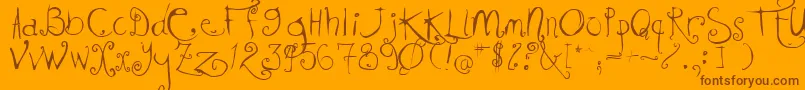 Fonte Kissmekissmekissme – fontes marrons em um fundo laranja