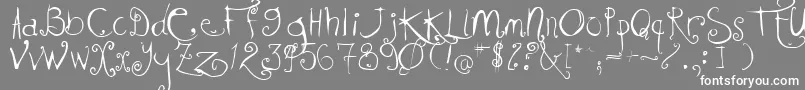Kissmekissmekissme Font – White Fonts on Gray Background