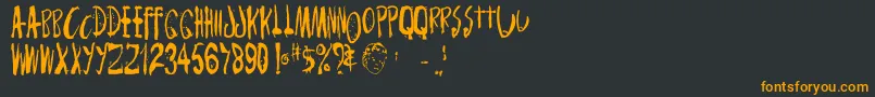 Monsterchild Font – Orange Fonts on Black Background