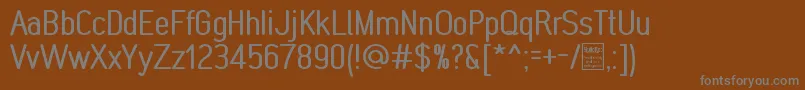 Шрифт MonabellaDemo – серые шрифты на коричневом фоне