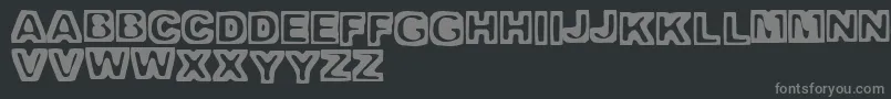 TrappedHeavy Font – Gray Fonts on Black Background