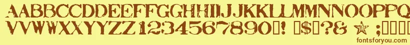 Fonte Stamp ffy – fontes marrons em um fundo amarelo