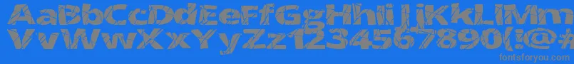 フォントCrackedWide – 青い背景に灰色の文字