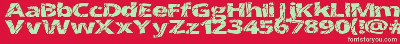 CrackedWide-Schriftart – Grüne Schriften auf rotem Hintergrund