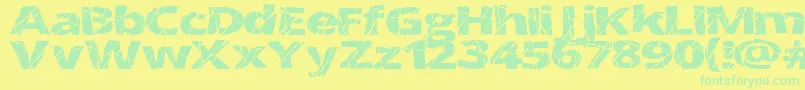 CrackedWide-Schriftart – Grüne Schriften auf gelbem Hintergrund