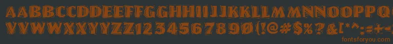 Linolettercutragged-fontti – ruskeat fontit mustalla taustalla