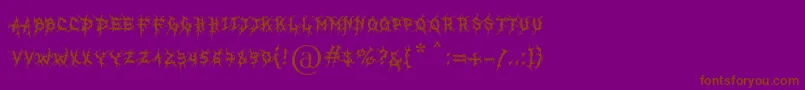 フォントMbRealGrinder – 紫色の背景に茶色のフォント