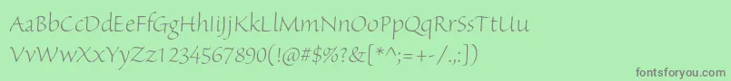 フォントSanvitoproLtdisp – 緑の背景に灰色の文字