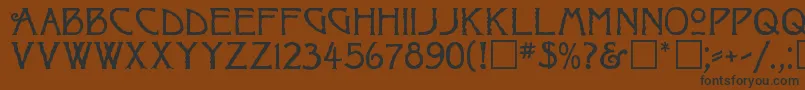 フォントRaggedRegular – 黒い文字が茶色の背景にあります