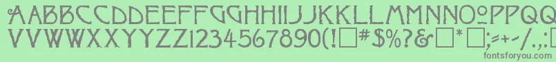 フォントRaggedRegular – 緑の背景に灰色の文字