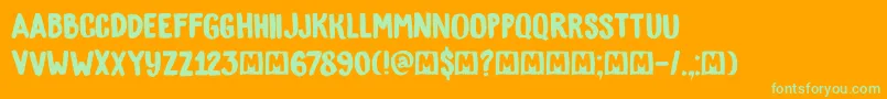 Czcionka DkBygone – zielone czcionki na pomarańczowym tle