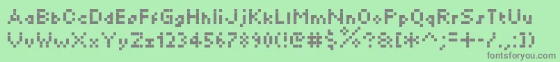 Saiba mais sobre a fonte Minikylie Fonte Minikylie – fontes cinzas em um fundo verde